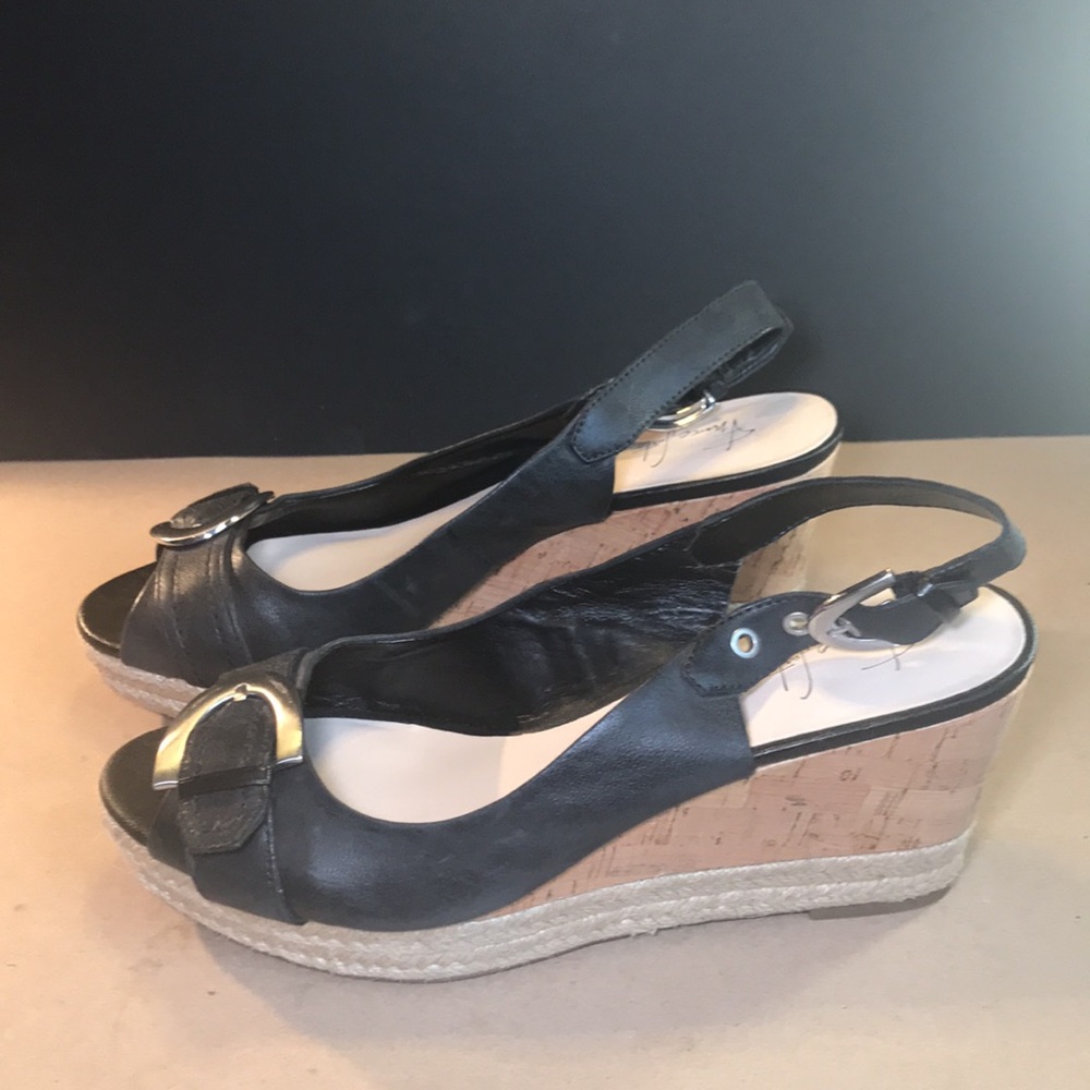 Franco Sarto black leather wedges in size 8.5.